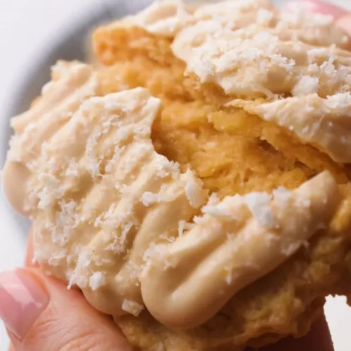 Lemon Coconut Cheesecake Cookies close up pulled apart