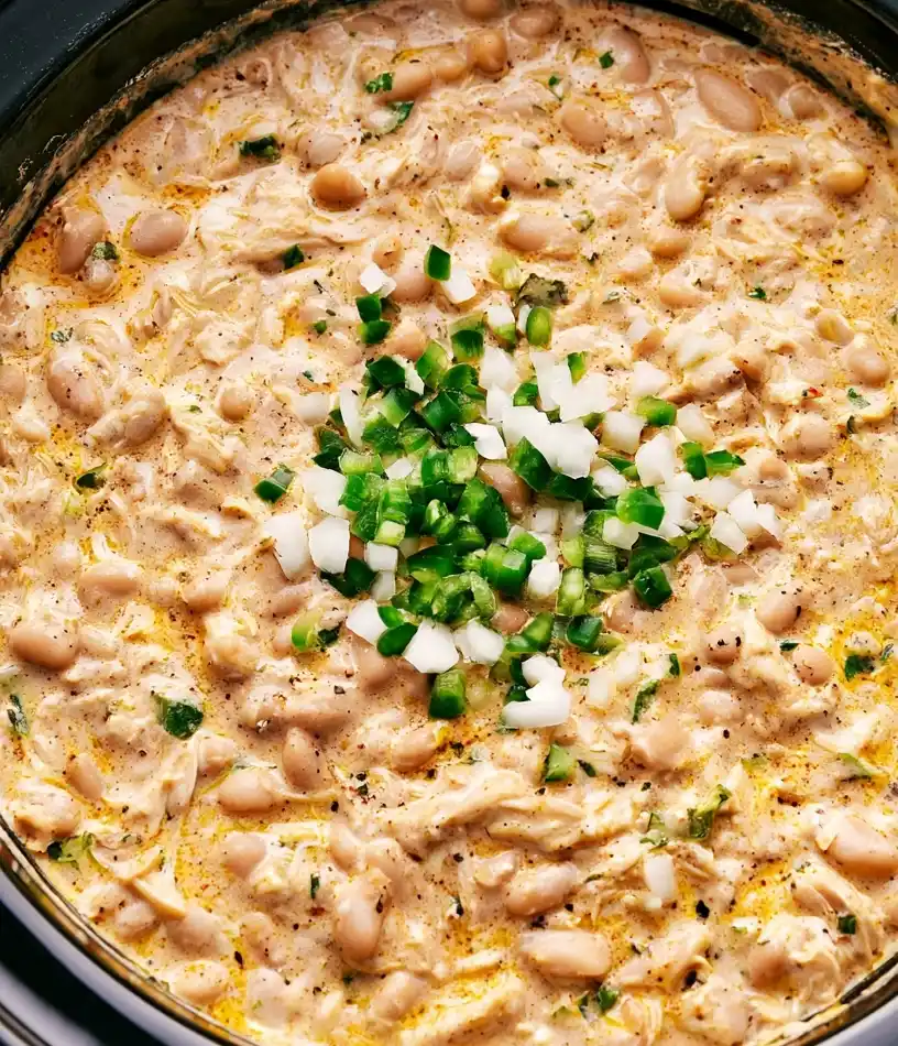 Crockpot White Chicken Chili in a slow cooker, close up view
