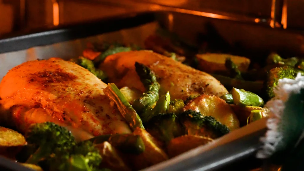 Sheet Pan Garlic Butter Chicken and Veggies in the oven