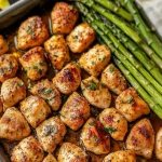 Garlic Butter Chicken Bites and Asparagus in a sheet pan
