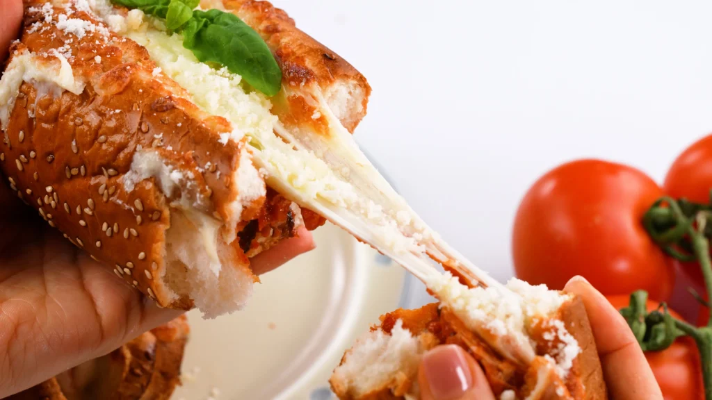 Easy Cheesy Meatball Subs close up, pulled apart