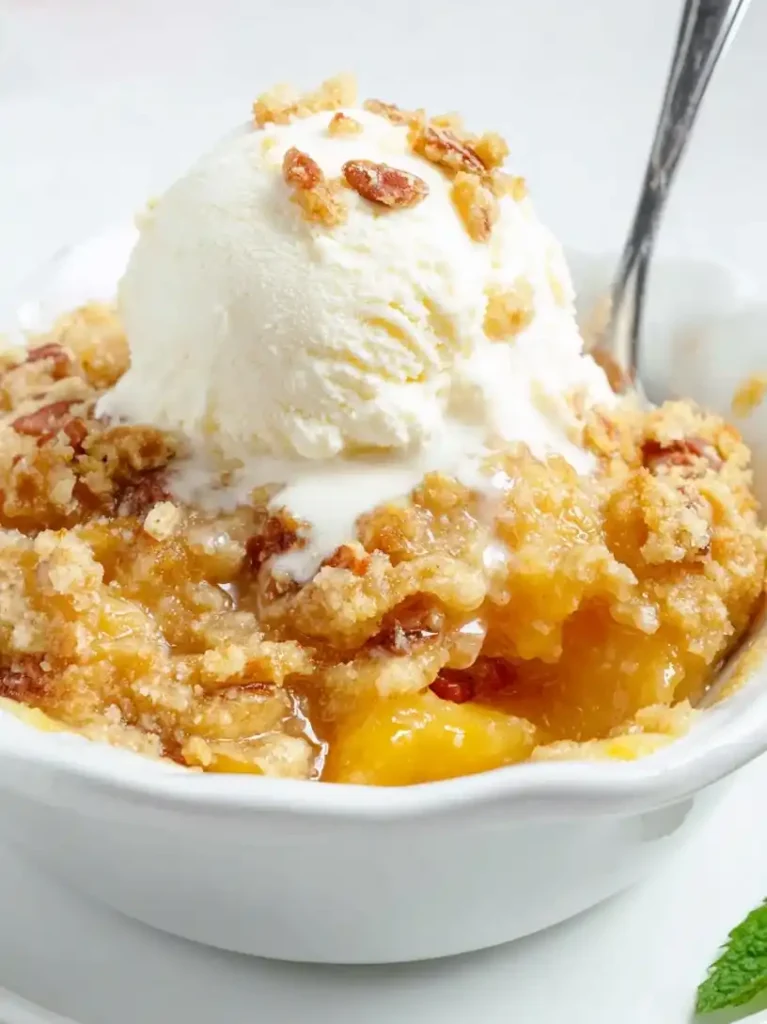 Peach Cobbler with Cake Mix Topping dish, close up